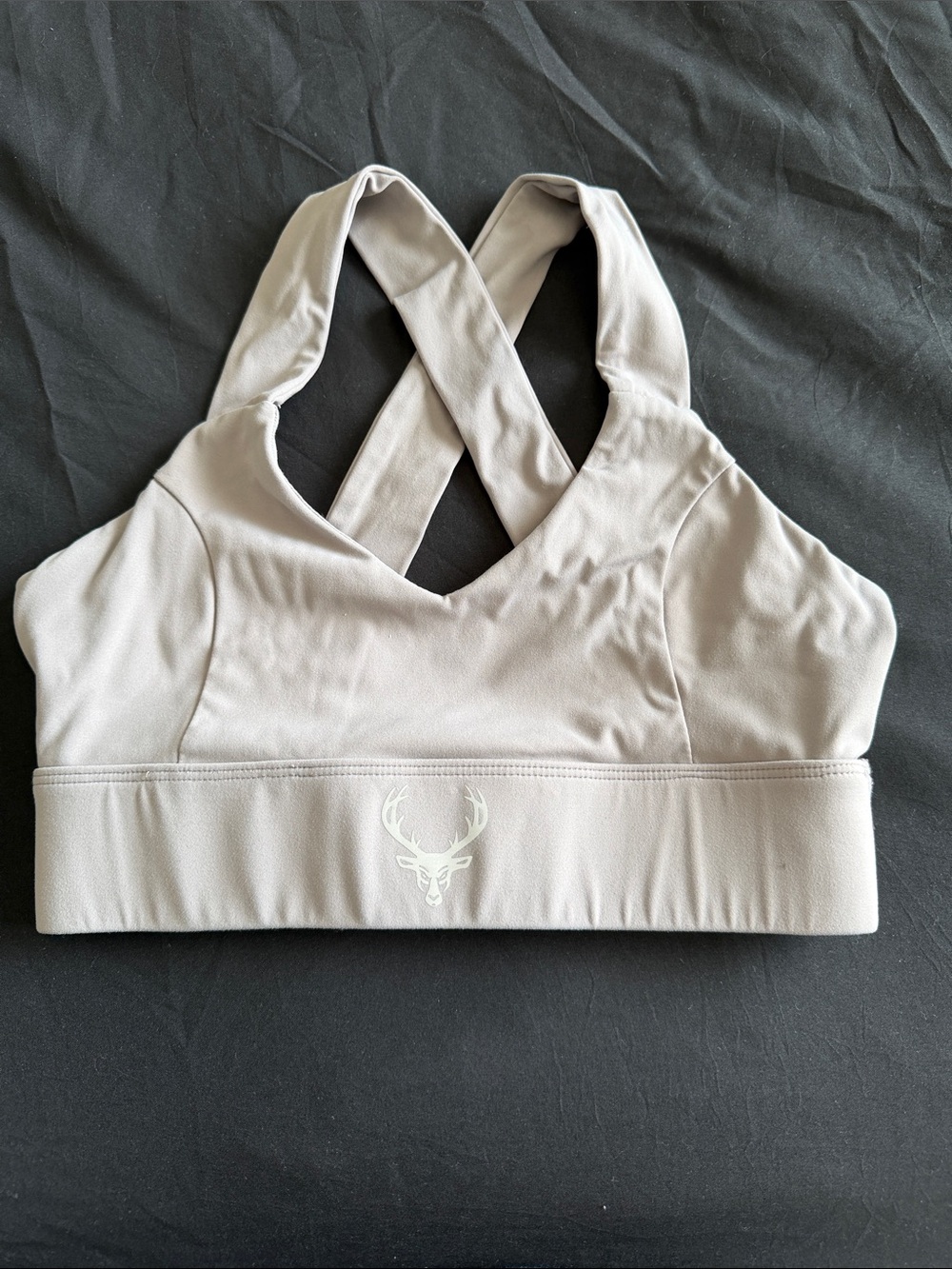 Gray crossed back Bucked Up sports Bra.